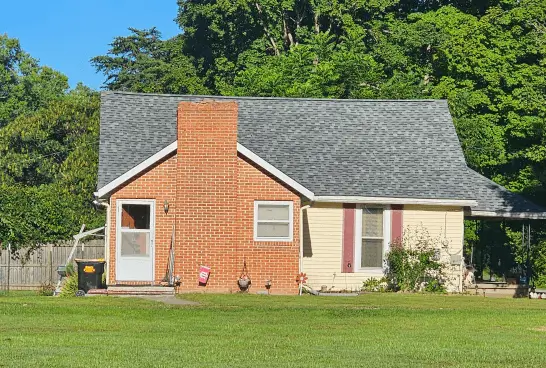 brick home with beautiful asphalt shingle roof bloomington